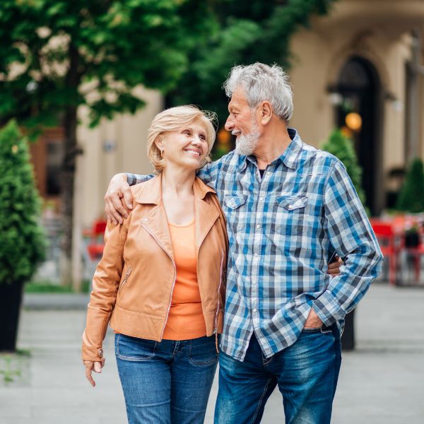 older couple walking city